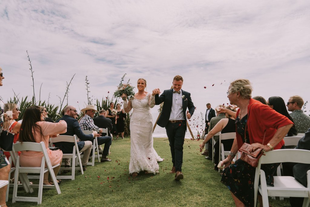 Real Bride Jamielle wearing her Custom Harriett Falvey Wedding Dress and Veil Made in New Zealand